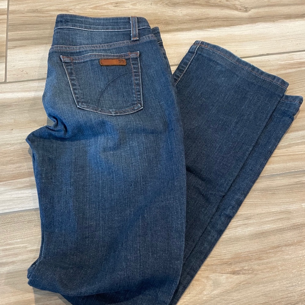 Medium-wash Boot-Cut jeans by Joe’s